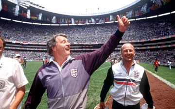 Bobby waves to the England fans at the Azteca.