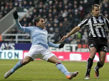 http://www.nufcblog.org/wp-content/uploads/2010/12/Carlos-Tevez-v-Newcastle.jpg