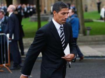 Hughton suited, now booted.