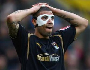 Newcastle's Leon Best in a face mask