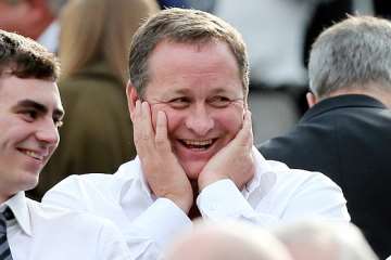 Mike Ashley laughing.