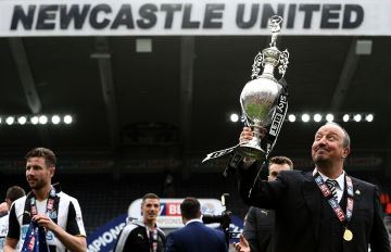 Rafa Benitez with Championship trophy.
